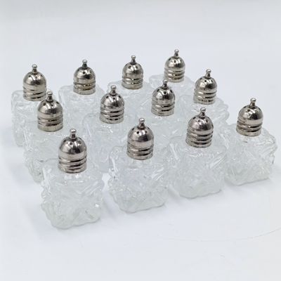 Set of 12 vintage salt shakers in box