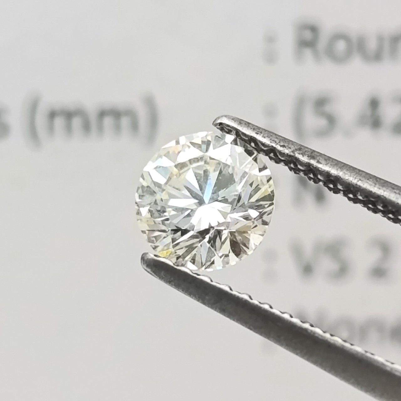 Natural Round Brilliant diamond of 0,66ct - Colour N, clarity VS 2 - with GEMLAB certificate