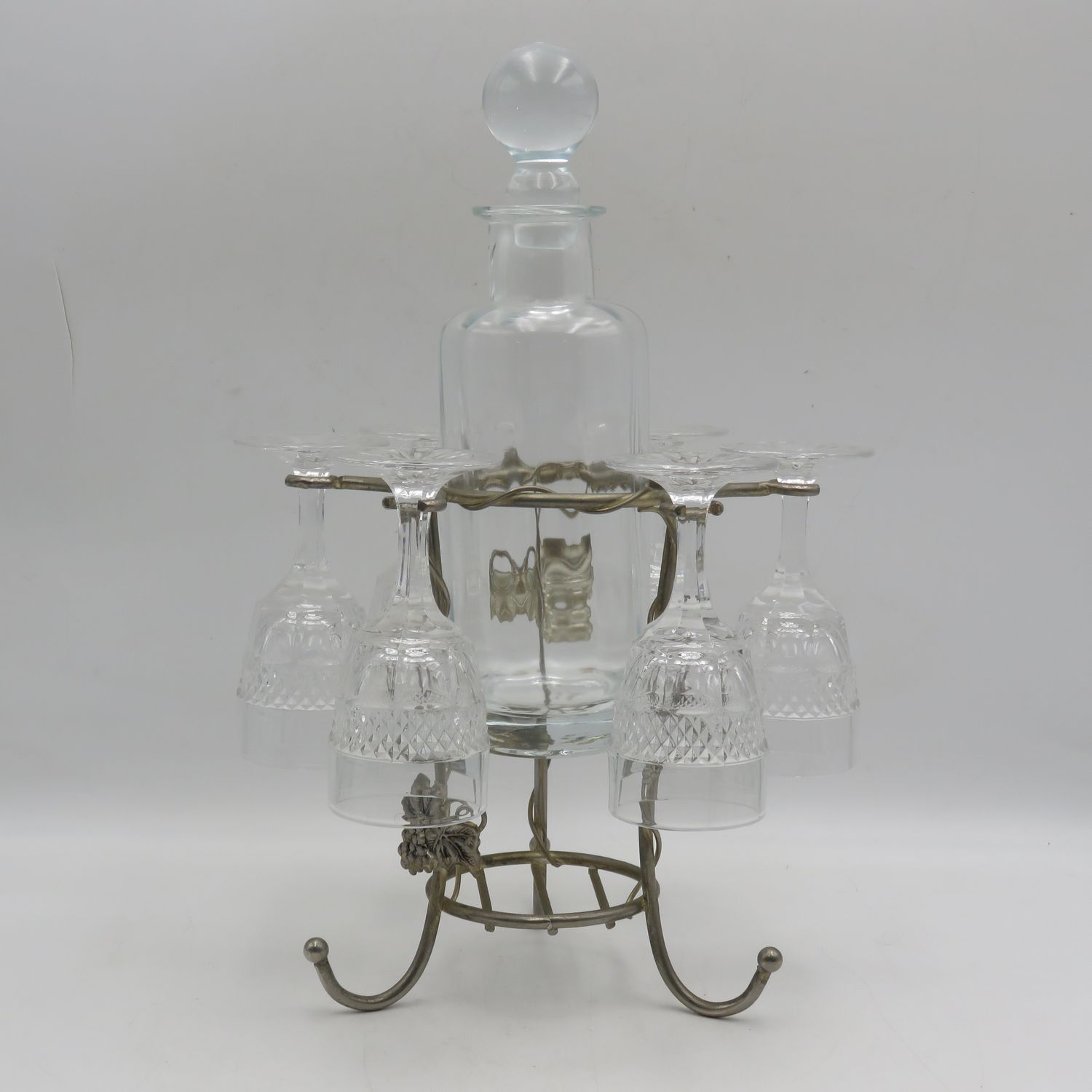 Beautiful wine bottle stand with decanter and six glasses