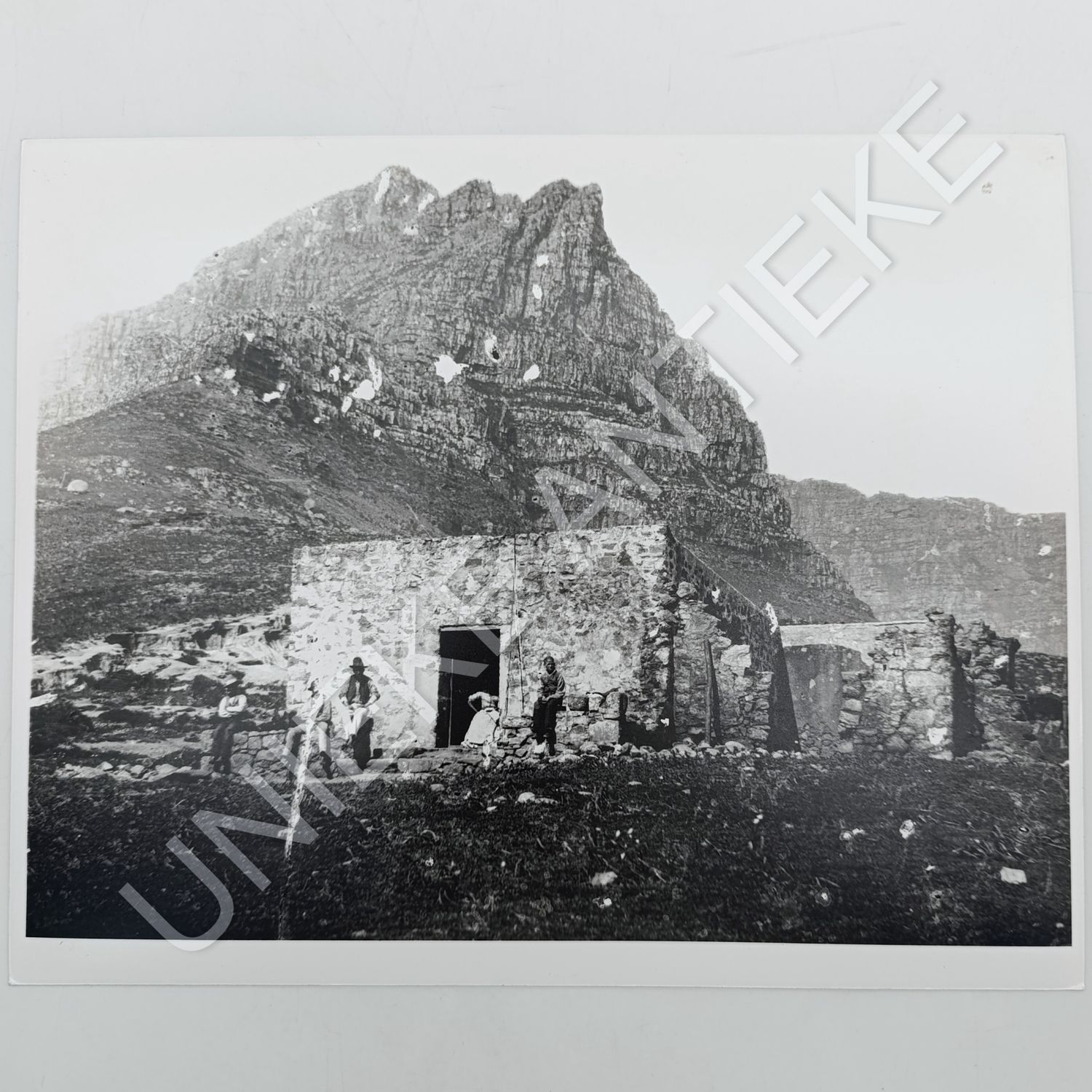 Antique photo reprint of stone house on Kloof corner Table Mountain