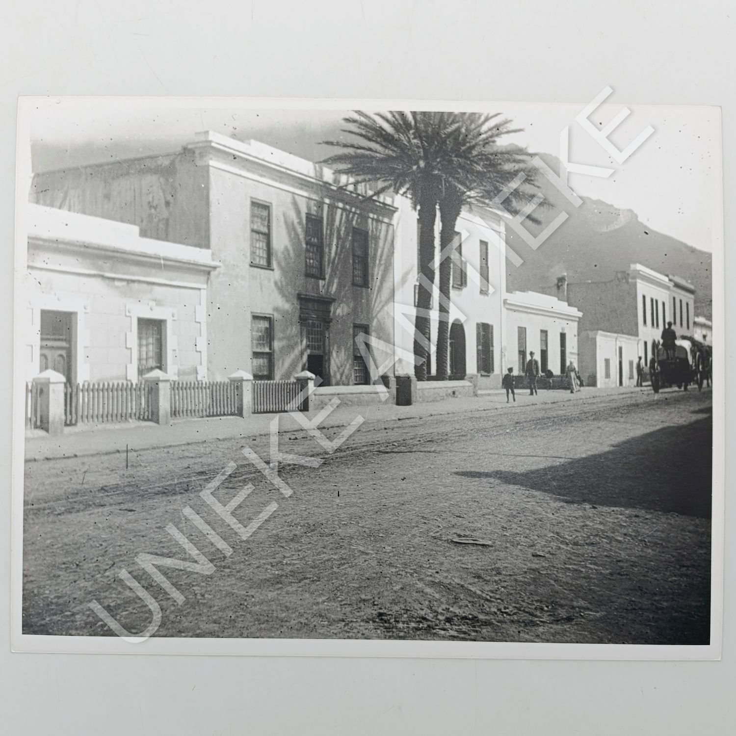 Antique photo reprint of buildings in District Six with Table Mountain in back
