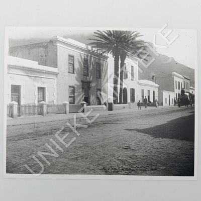 Antique photo reprint of buildings in District Six with Table Mountain in back