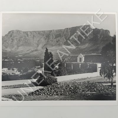 Antique photo reprint of Tamboerskloof farm house with Table Mountain in back