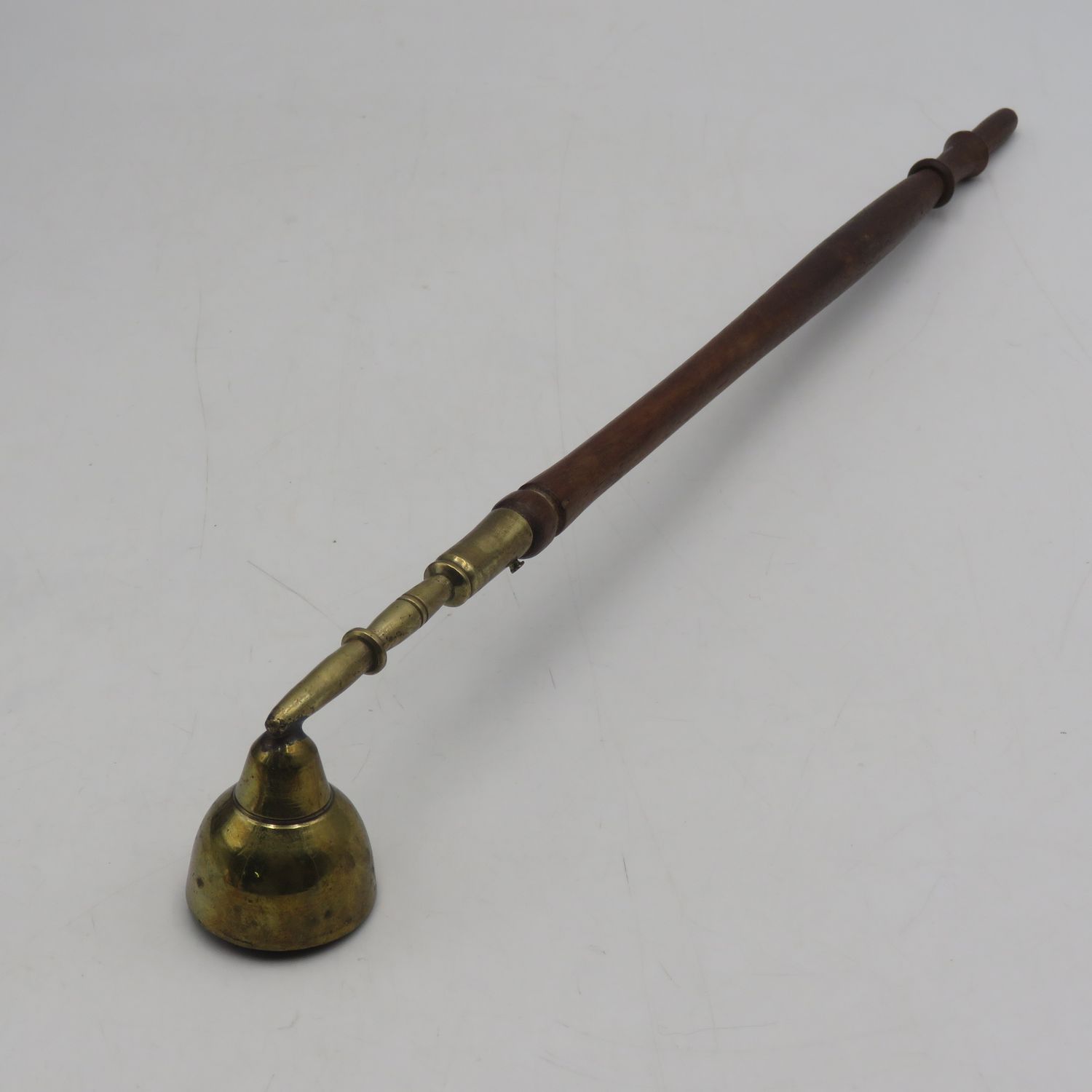 Vintage brass and wood candle snuffer