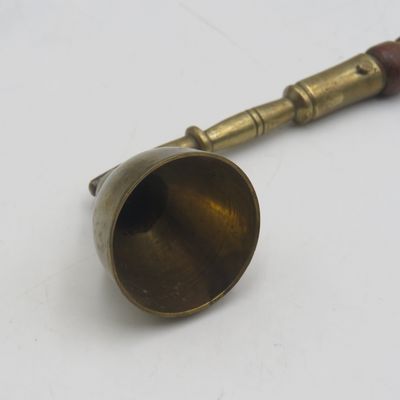 Vintage brass and wood candle snuffer