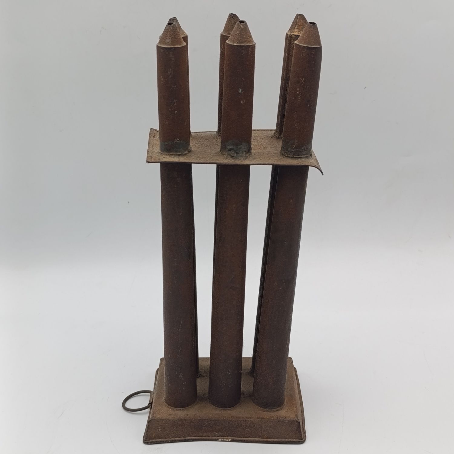 Antique tin 6-tube candle mold