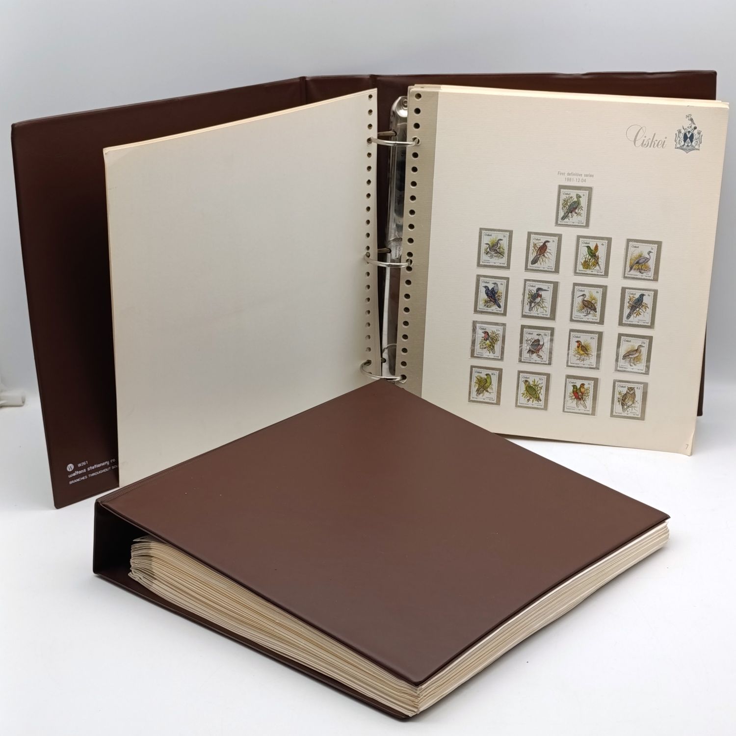 Lot of 2 Albums with over 600  Ciskei mint unhinged and used stamps on cover - 1981 and later