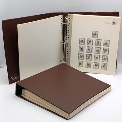 Lot of 2 Albums with over 600  Ciskei mint unhinged and used stamps on cover - 1981 and later