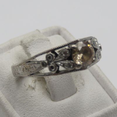 Bespoke 9kt White gold ring with Champagne citrine with 12 small diamonds in design - weighs 5,4g - size L