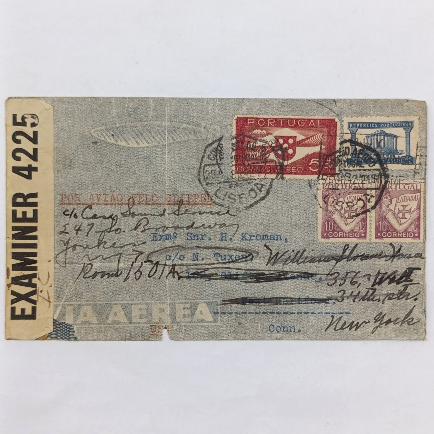 WW2 Postal cover from Lisbon Portugal to Conneticut USA, Twice rerouted to New York Addresses - with censor lable and 4 Portuguese stamps backstamped Sloan House YMCA - some damage