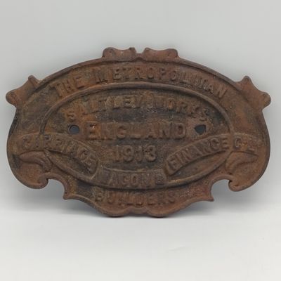 Antique 1913 The Metropolitan Carriage wagon builders cast iron plate