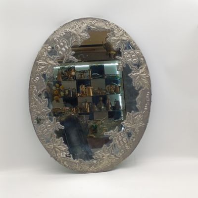 Antique oval mirror with grapevine pewter atrwork frame