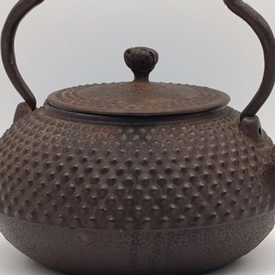 Antique 19th century Japanese cast iron teapot with makers mark below spout