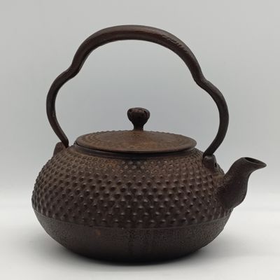 Antique 19th century Japanese cast iron teapot with makers mark below spout