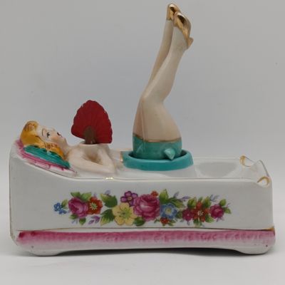 Vintage Naughty Nodder girl ashtray with moving legs