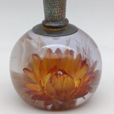Vintage flower vase with flowers in resin base and silverplated flute