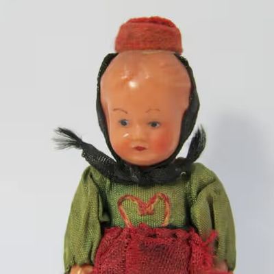 Small vintage boy doll