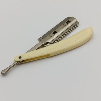 Vintage Durham Duplex straight razor with extra disposable blades