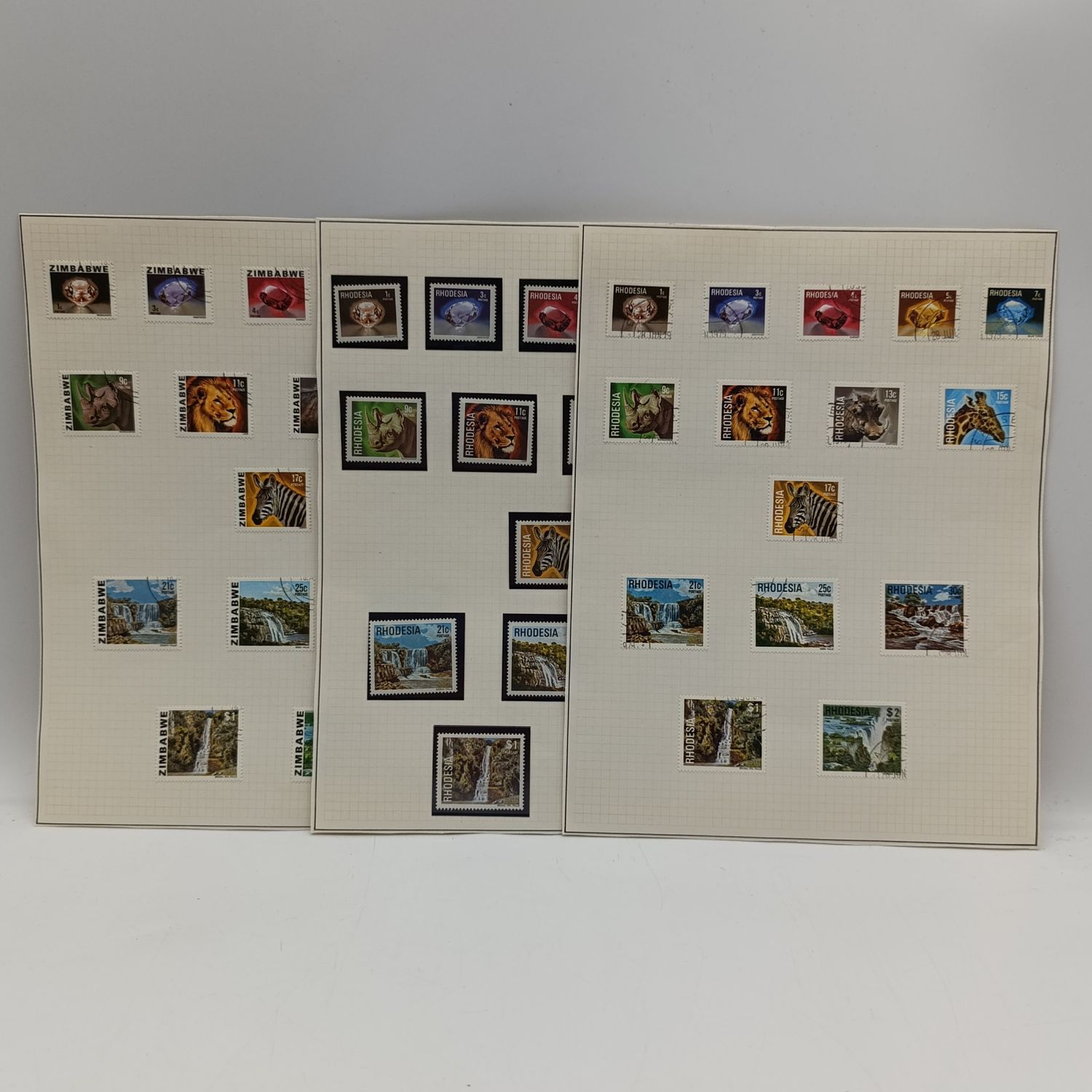 Last Rhodesia definitive series of stamps - both used and mint - plus First Zimbabwe set used