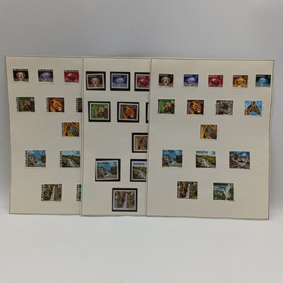 Last Rhodesia definitive series of stamps - both used and mint - plus First Zimbabwe set used