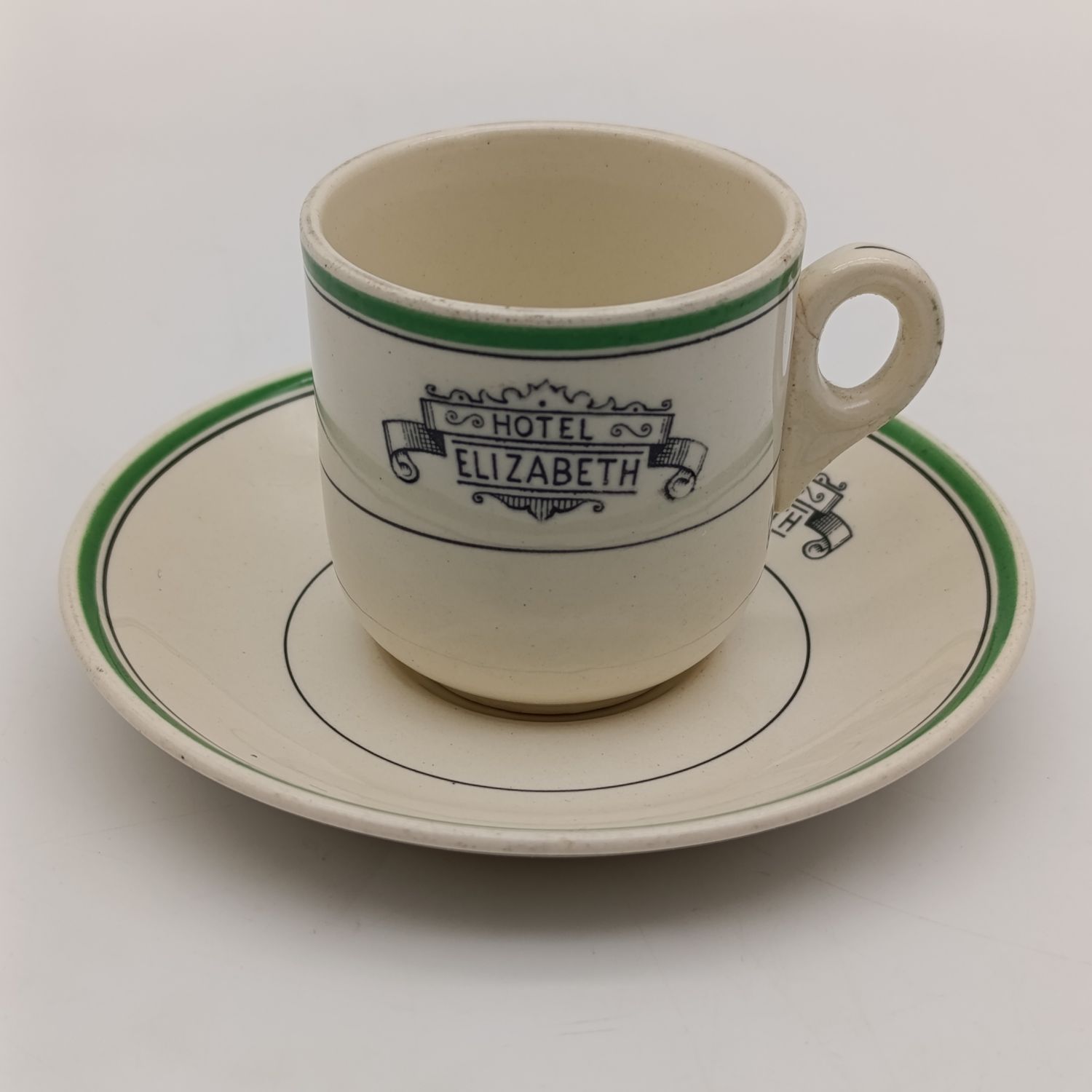 Vintage Hotel Elizabeth porcelain cup and saucer - crack on handle