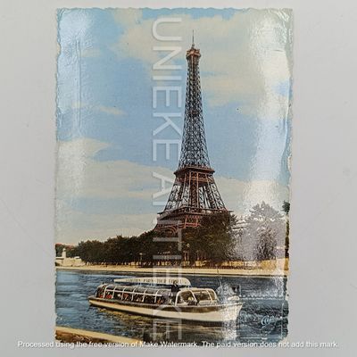 Vintage 1960 Postcard with the Eiffel Tower - Paris posted to Pretoria , South Africa - Message in German about the high cost and beauty of the city and plans to visit the Opera