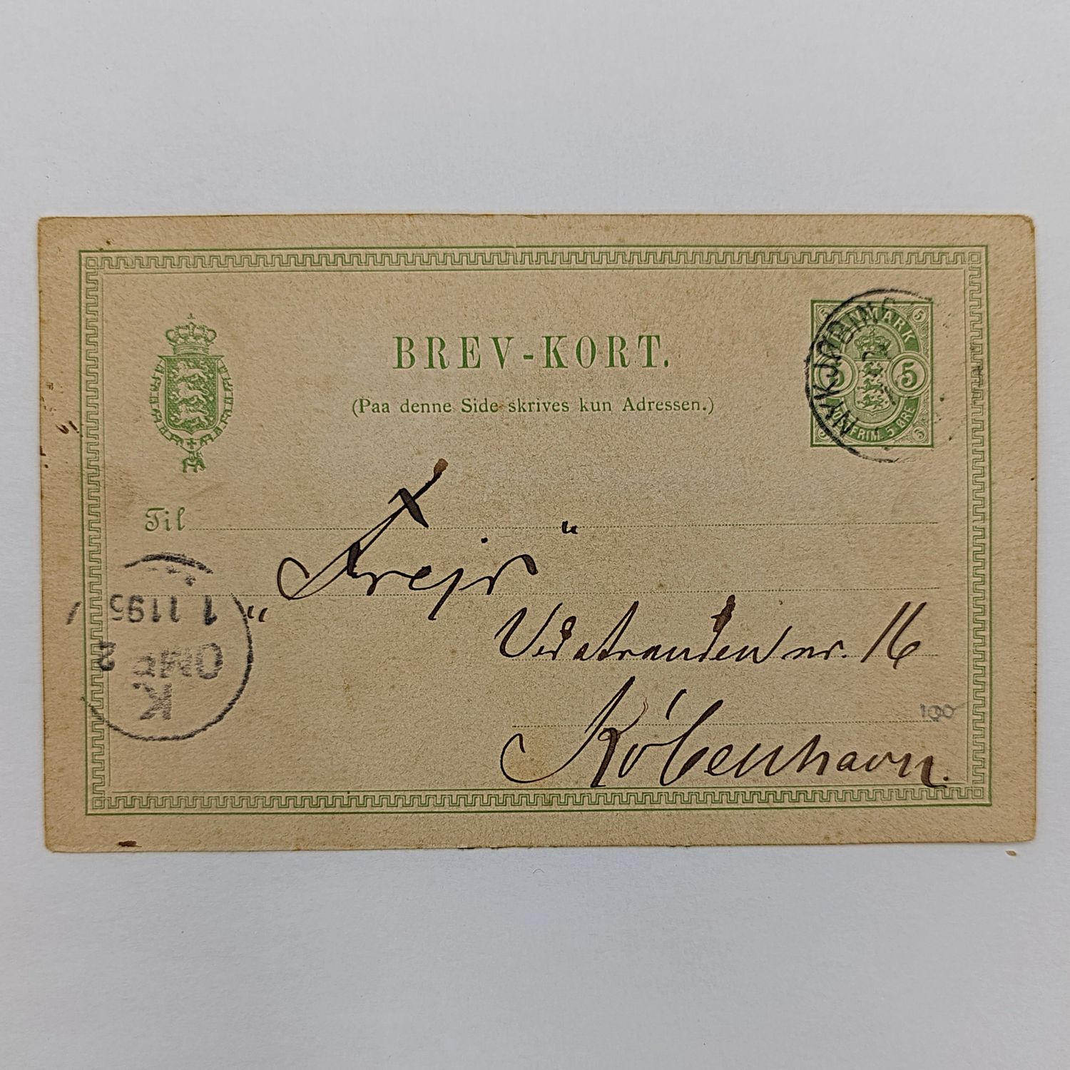 Postcard dated 1 Nov 1895 with pre printed Denmark postage stamp posted to Kopenhage from Nykjobing with message in Danish