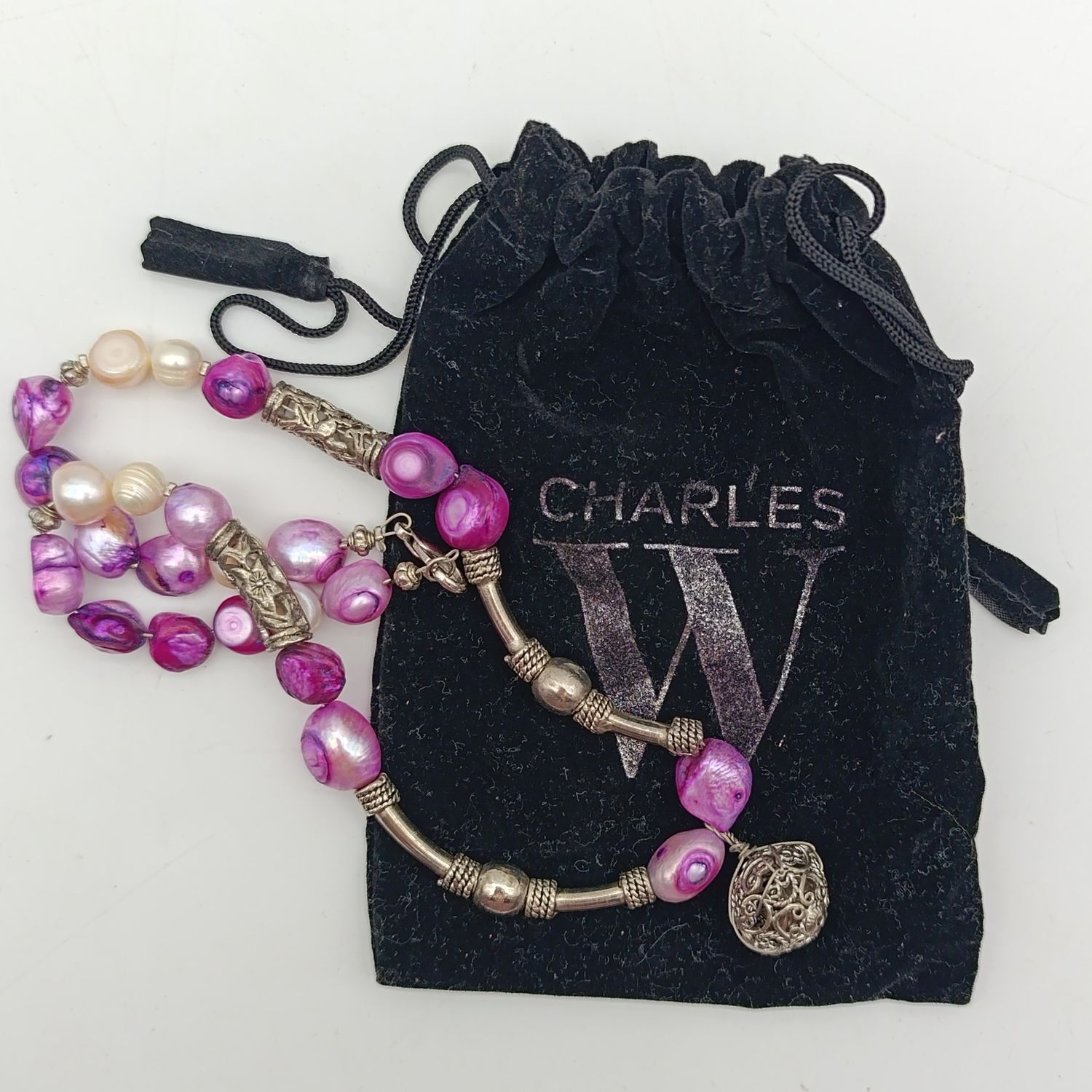 Pink and white free form pearl, necklace with small bell 44 cm long