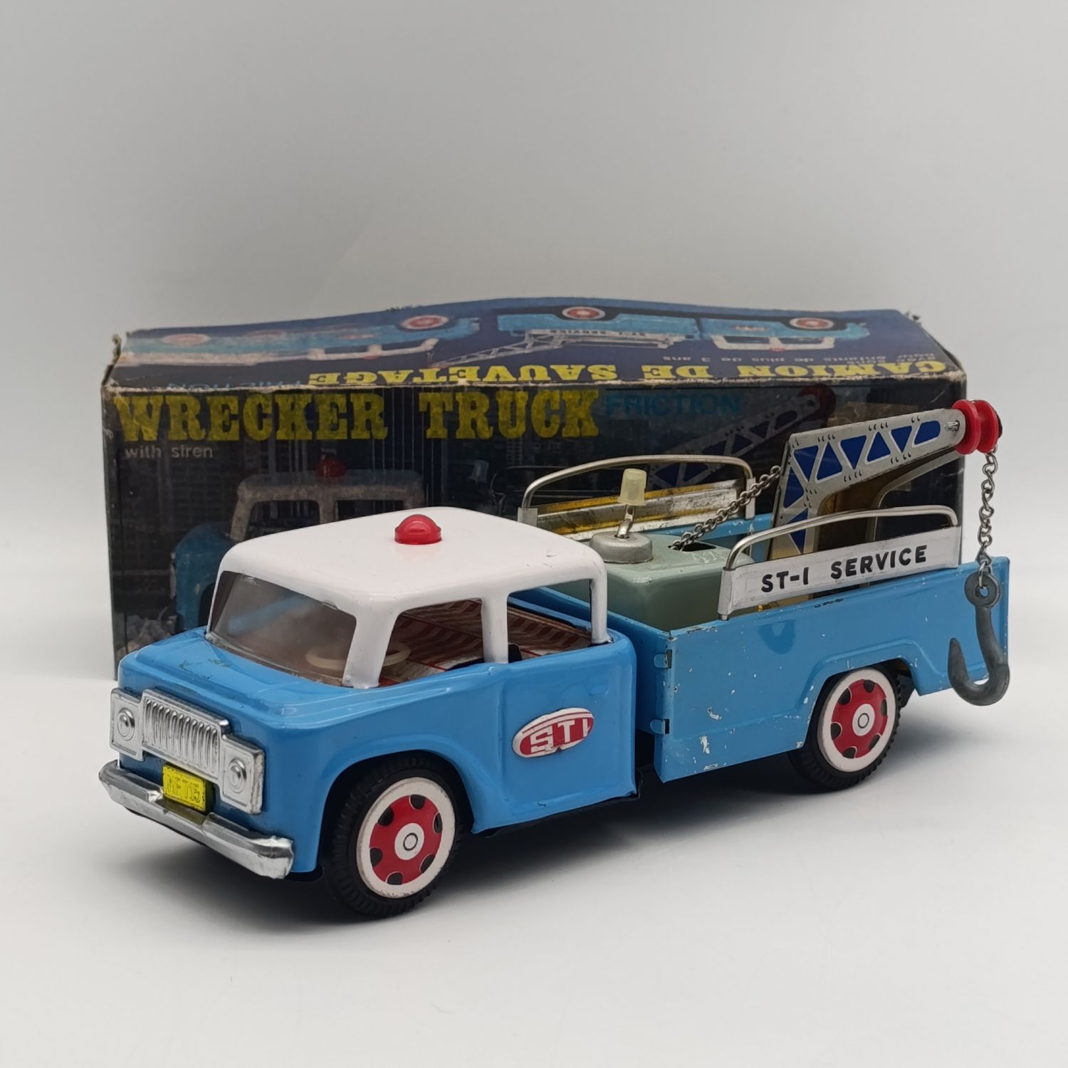 Vintage Chinese tinplate MF-715 wrecker truck friction toy car - box has some oil damage