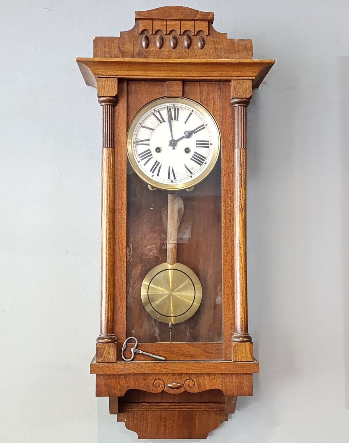 Antique wooden wall hanging clock