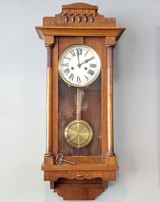 Antique wooden wall hanging clock