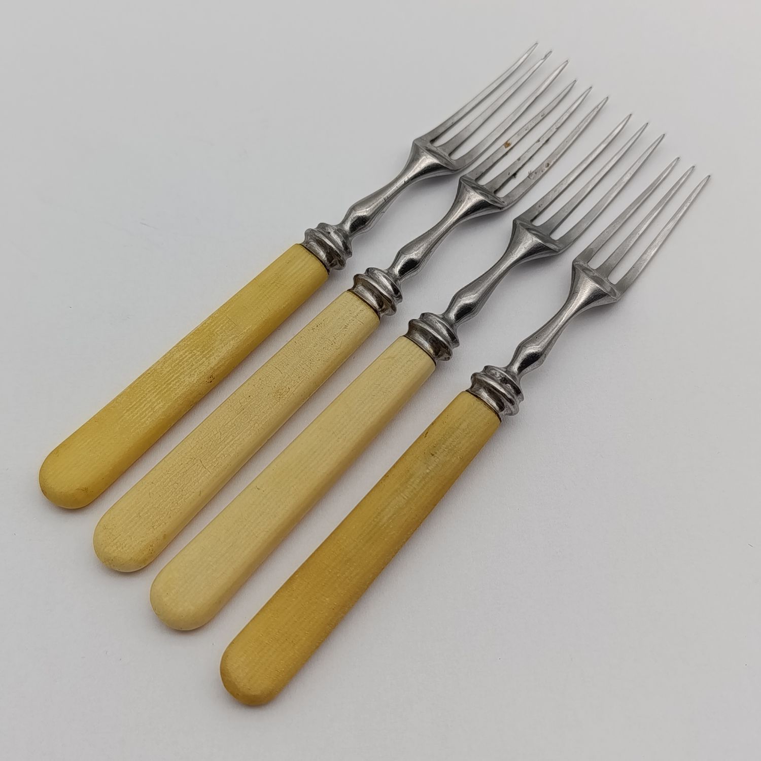 Set of 4 vintage forks with bone type handles