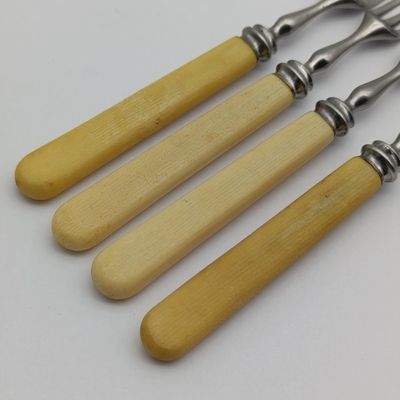 Set of 4 vintage forks with bone type handles