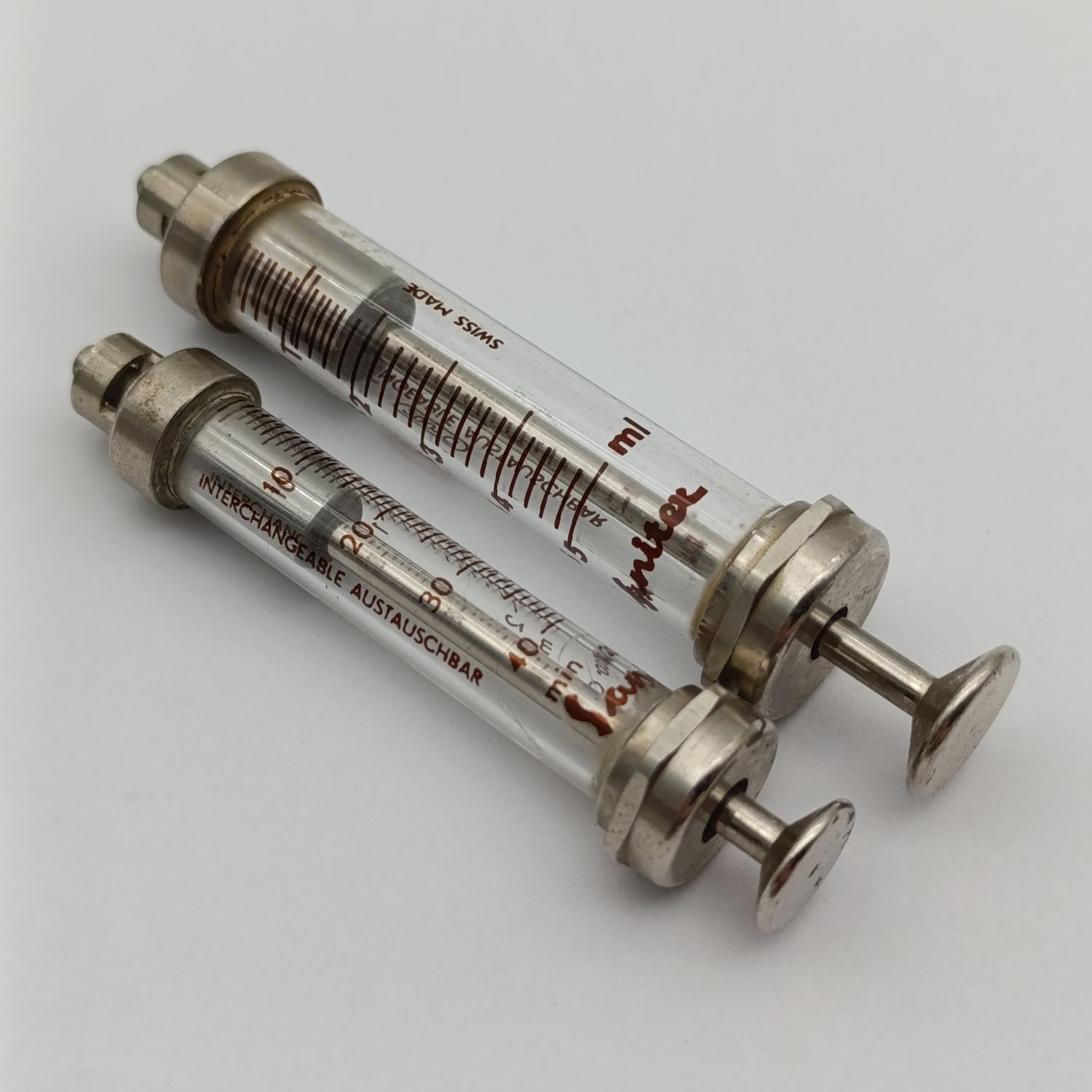 Lot of 2 vintage glass syringes
