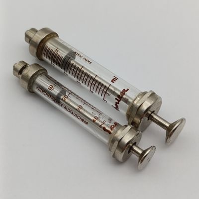 Lot of 2 vintage glass syringes