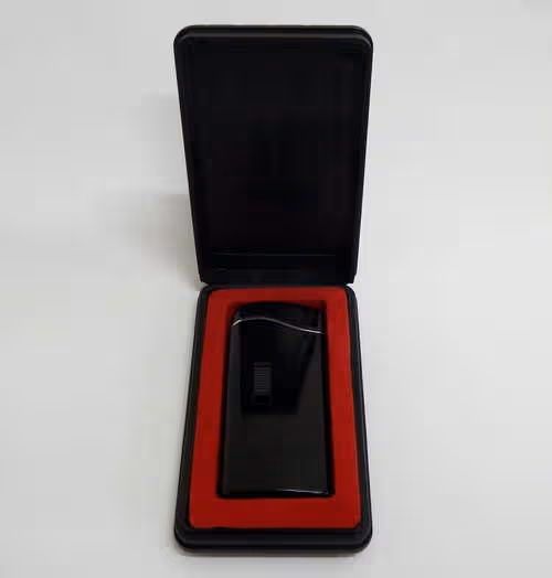 Vintage black electric pocket lighter in case - not working