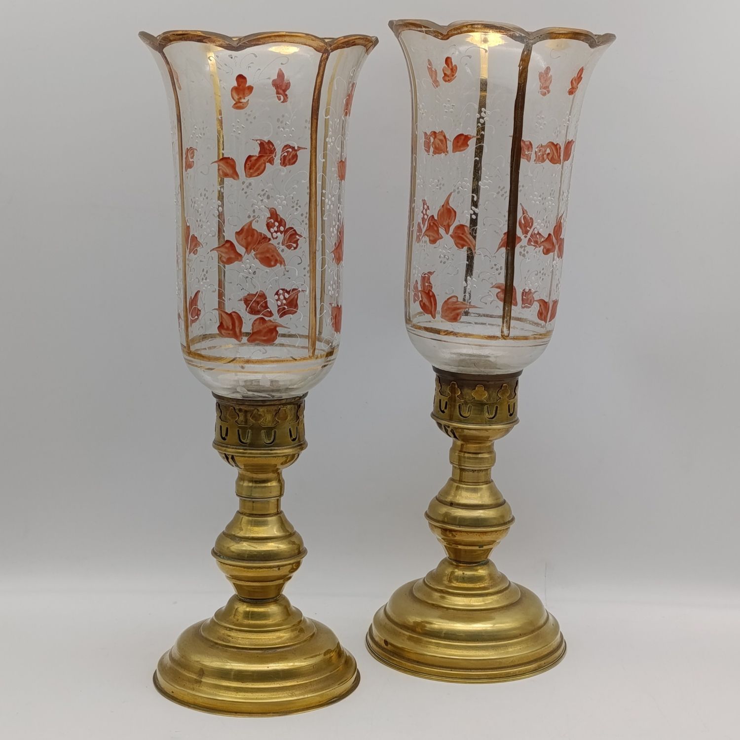 Pair of vintage brass candlesticks with hand painted glass shades
