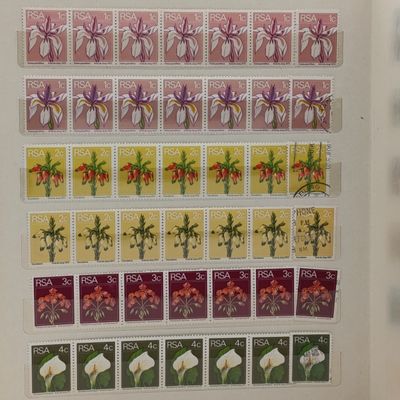 18 Page stamp album (slip in) with about 520 South Africa (mostly) stamps