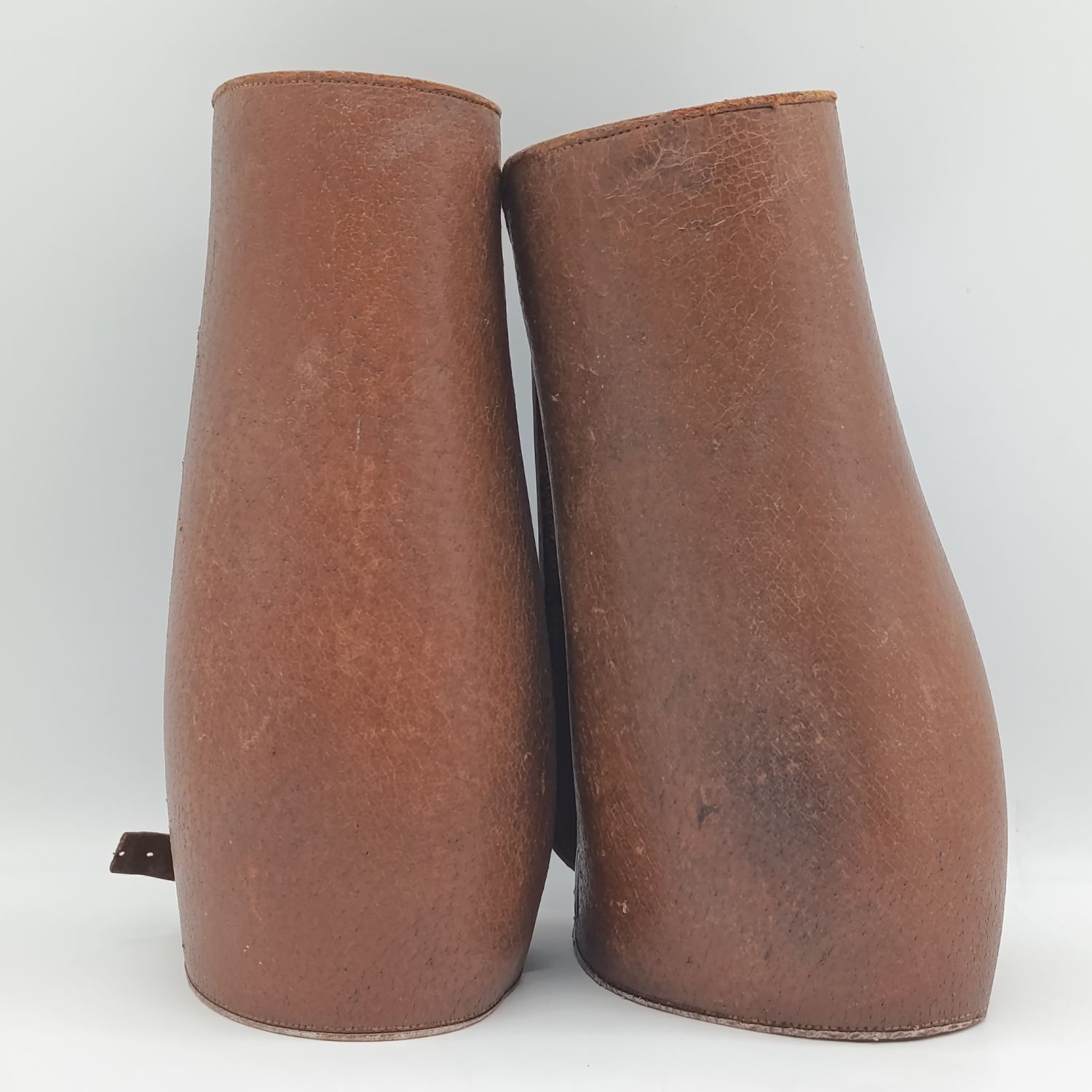 Pair of leather SADF Puttees - straps broken
