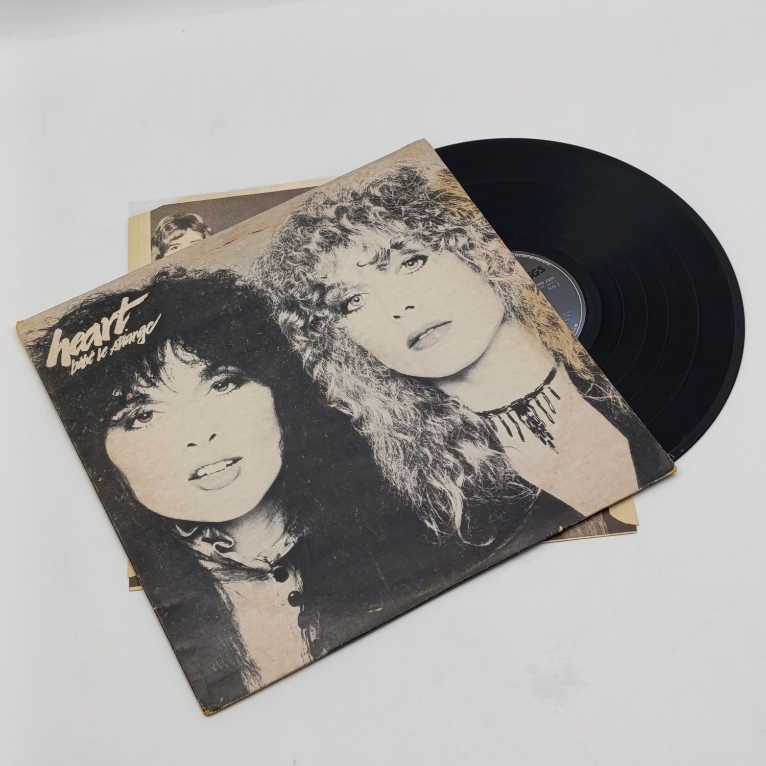 Record  Heart - Bebe Le Strange  Label : Epic  Released 1980 South Africa  Media - Very Good Plus (VG+) Sleeve - Very Good Plus (VG+)