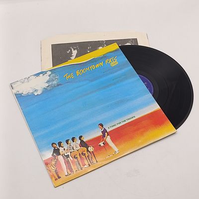 Record  The Boomtown Rats - A Tonic For The Troops  Released 1979 South Africa  Media- Very Good Plus (VG+) Sleeve - Very Good Plus (VG+) Inner Sleeve present