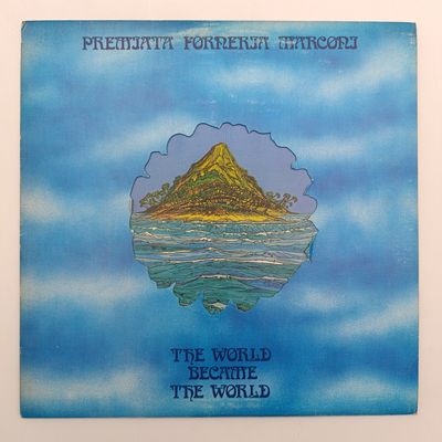 Record Premiata Forneria Marconi - The World Became The world Released 1974 United Kingdom Media - Very Good Plus (VG+) Sleeve - Very Good Plus (VG+) Inner Sleeve present
