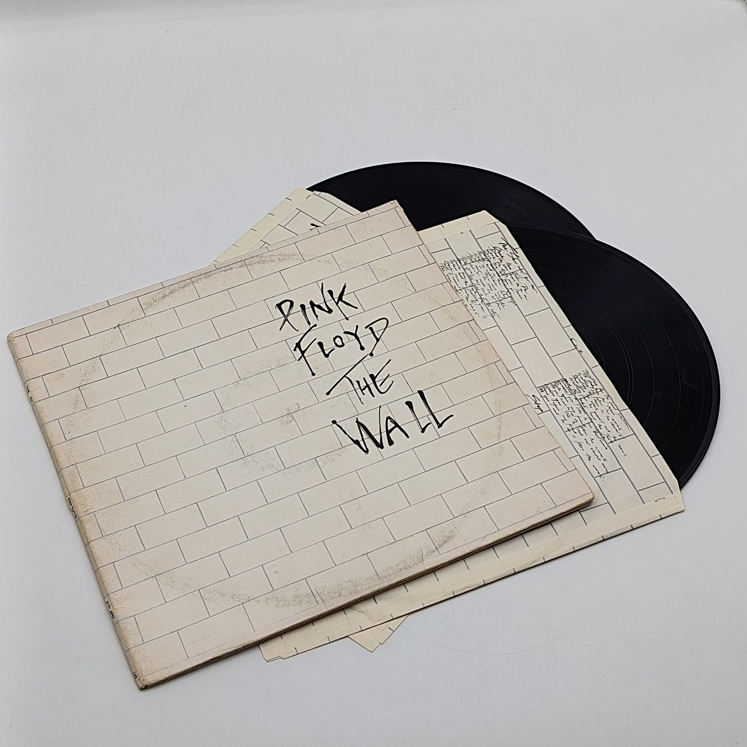 x 2 Records  Pink Floyd – The Wall Label: CBS  Released 1979 South Africa Media 1 and 2 Very Good Plus (VG+) Sleeve - Very Good (VG) Both Inner Sleeve present