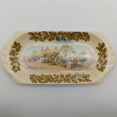 Royal Doulton Old English inns porcelain snack plate