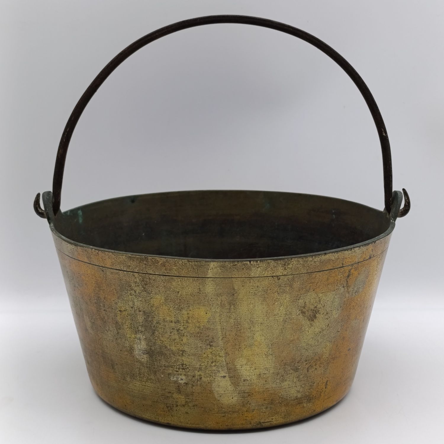 Antique brass cooking pot with iron handle
