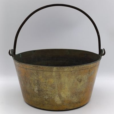Antique brass cooking pot with iron handle