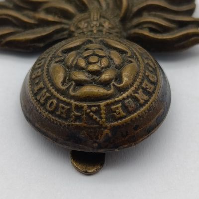 WW1 Royal Fusiliers officer's cap badge with slide