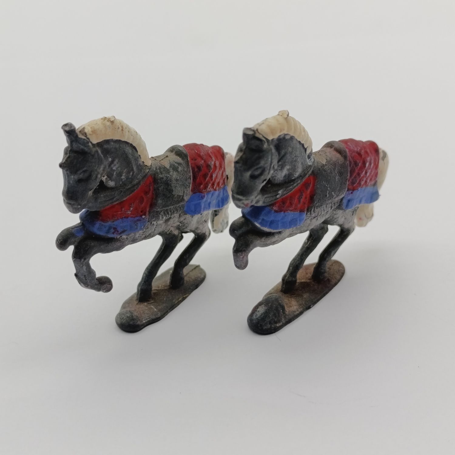 Pair of vintage knights lead horses figurines