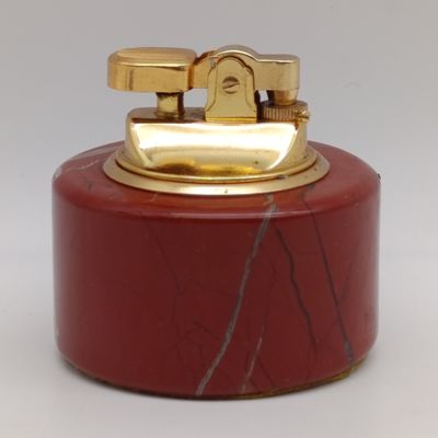 Vintage Penguin table lighter with marble base