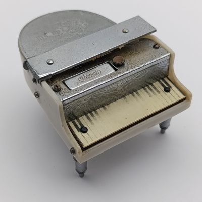 Vintage Prince Piano shaped table lighter